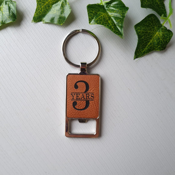 Personalised 3 year wedding anniversary gift. Leatherette Bottle opener keyring